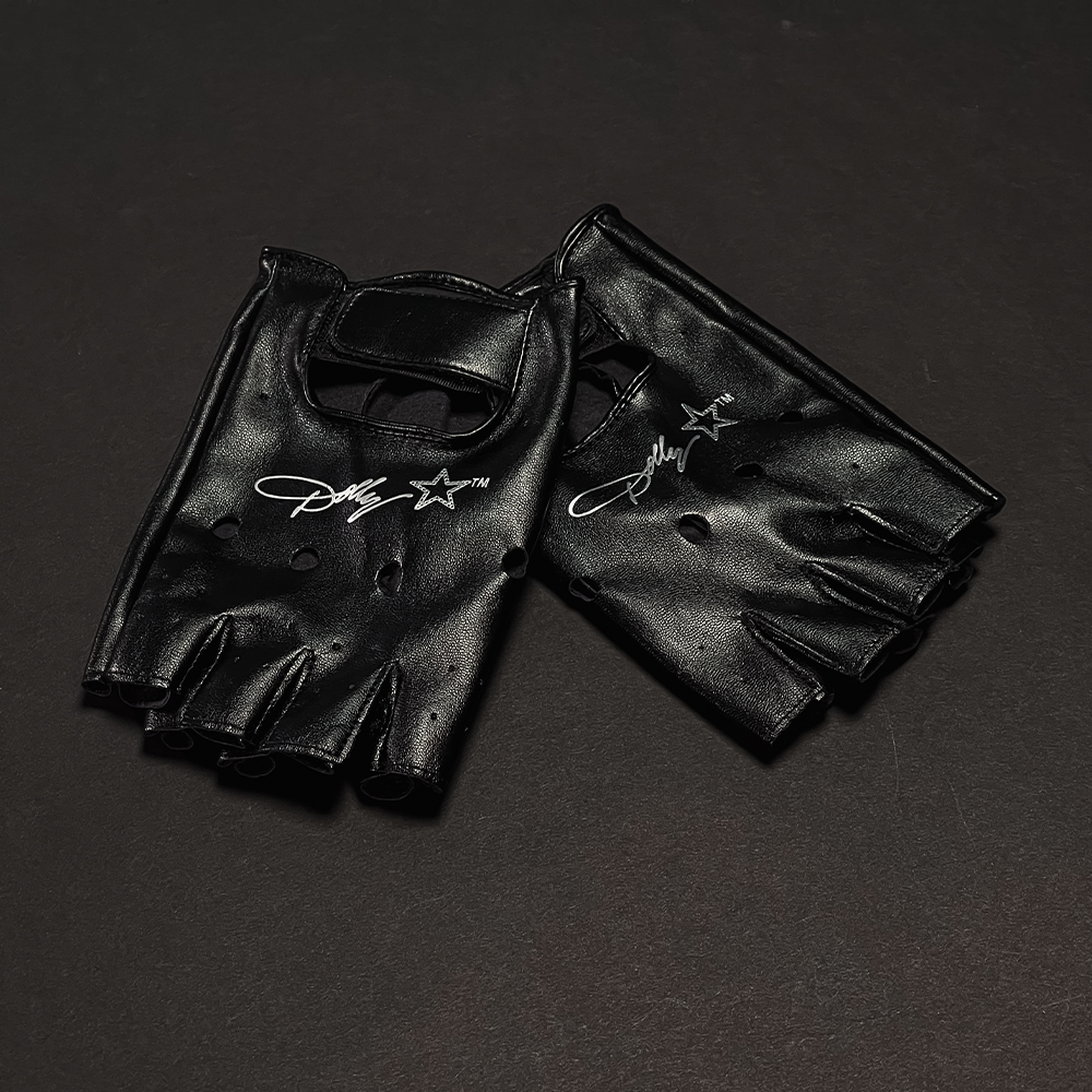 Official Dolly Parton Merchandise. PU leather fingerless gloves featuring the Dolly Parton Rockstar logo. Finish off your rocker look with this iconic gloves.